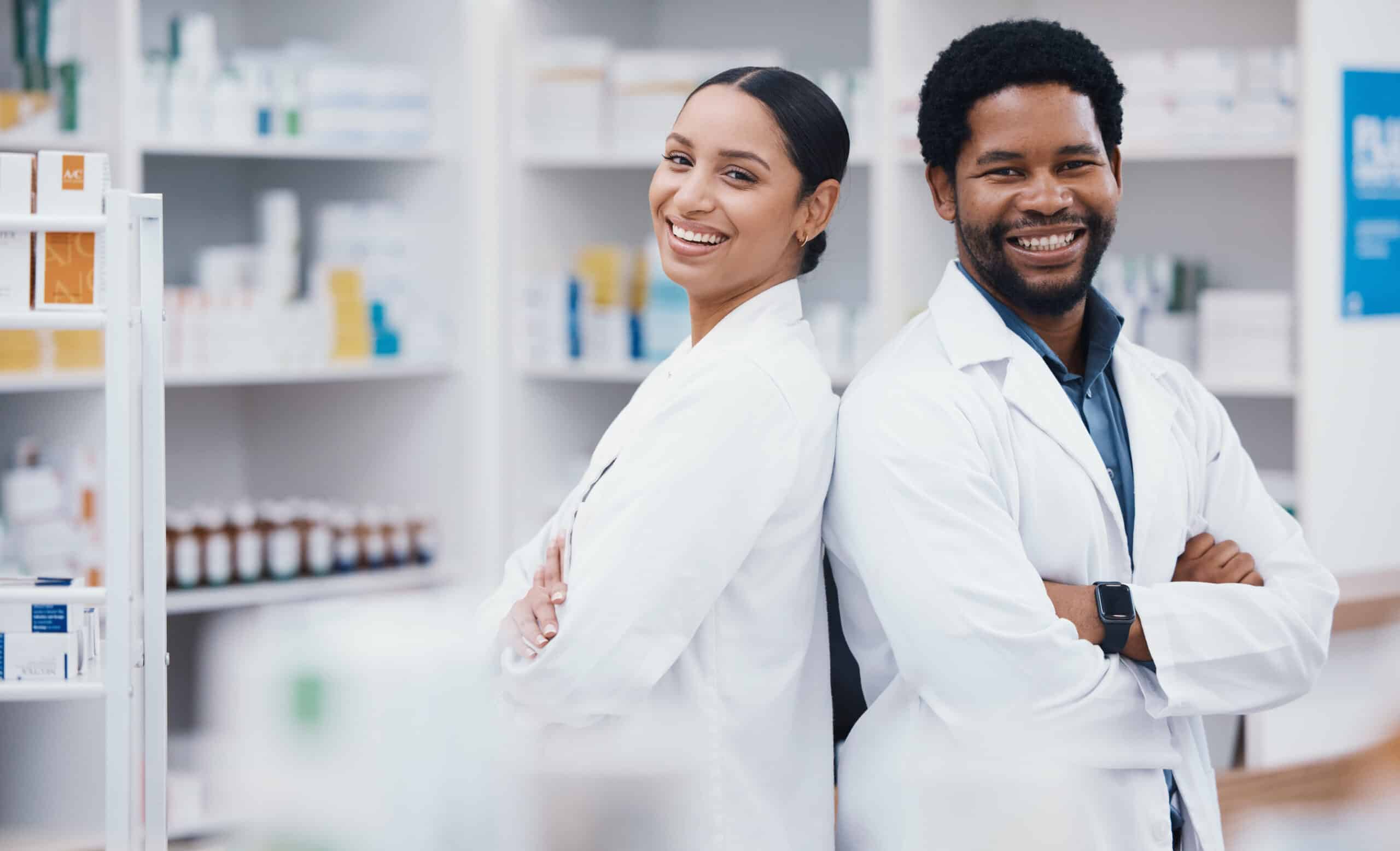 Pharmacists, people and arms crossed in portrait, medicine trust or about us healthcare in medical drugstore collaboration. Smile, happy and confident pharmacy teamwork in retail consulting or help.